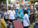 Kejari Way Kanan Hadiri Pencanangan Desa Tapis dan Penyaluran Bantuan TP PKK Provinsi Lampung di Kampung Negeri Baru
